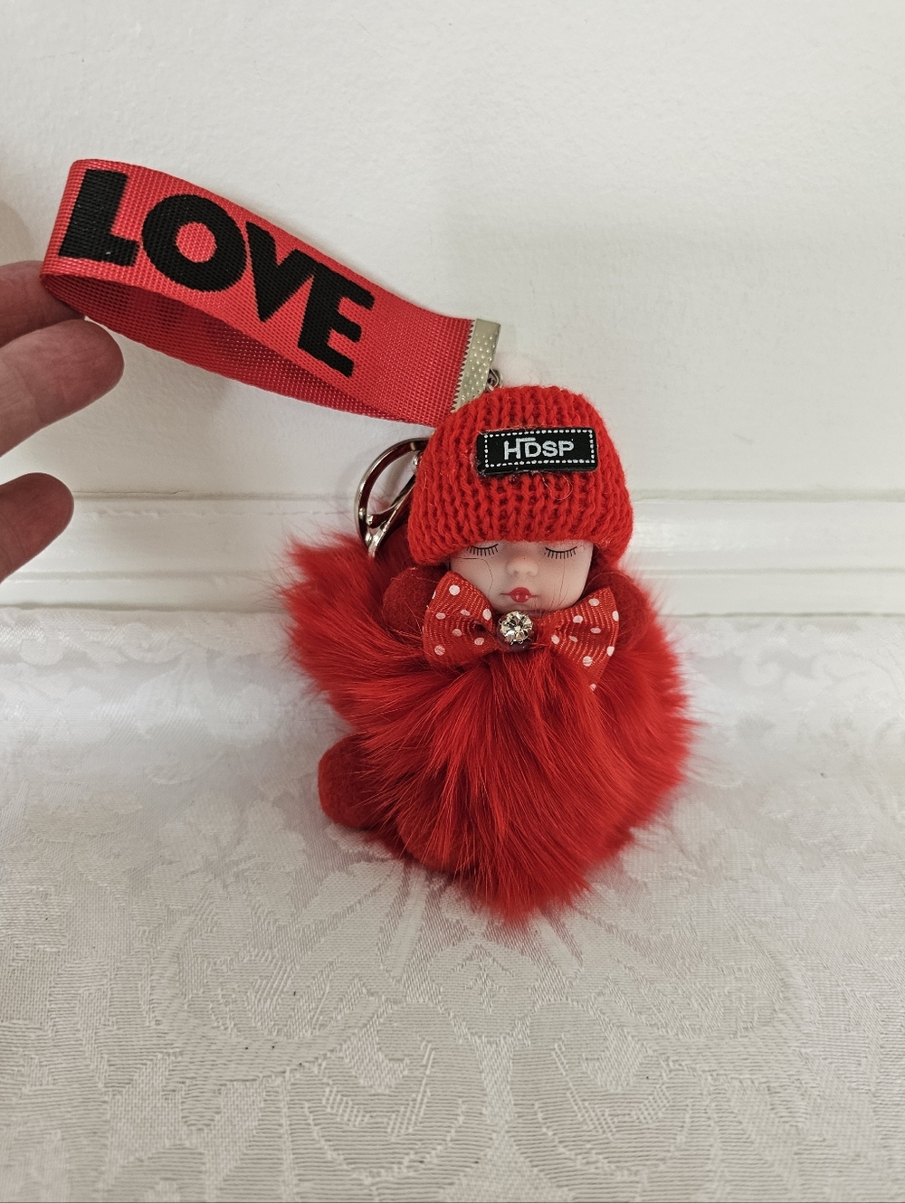 Pompom Sleeping Baby Keychain